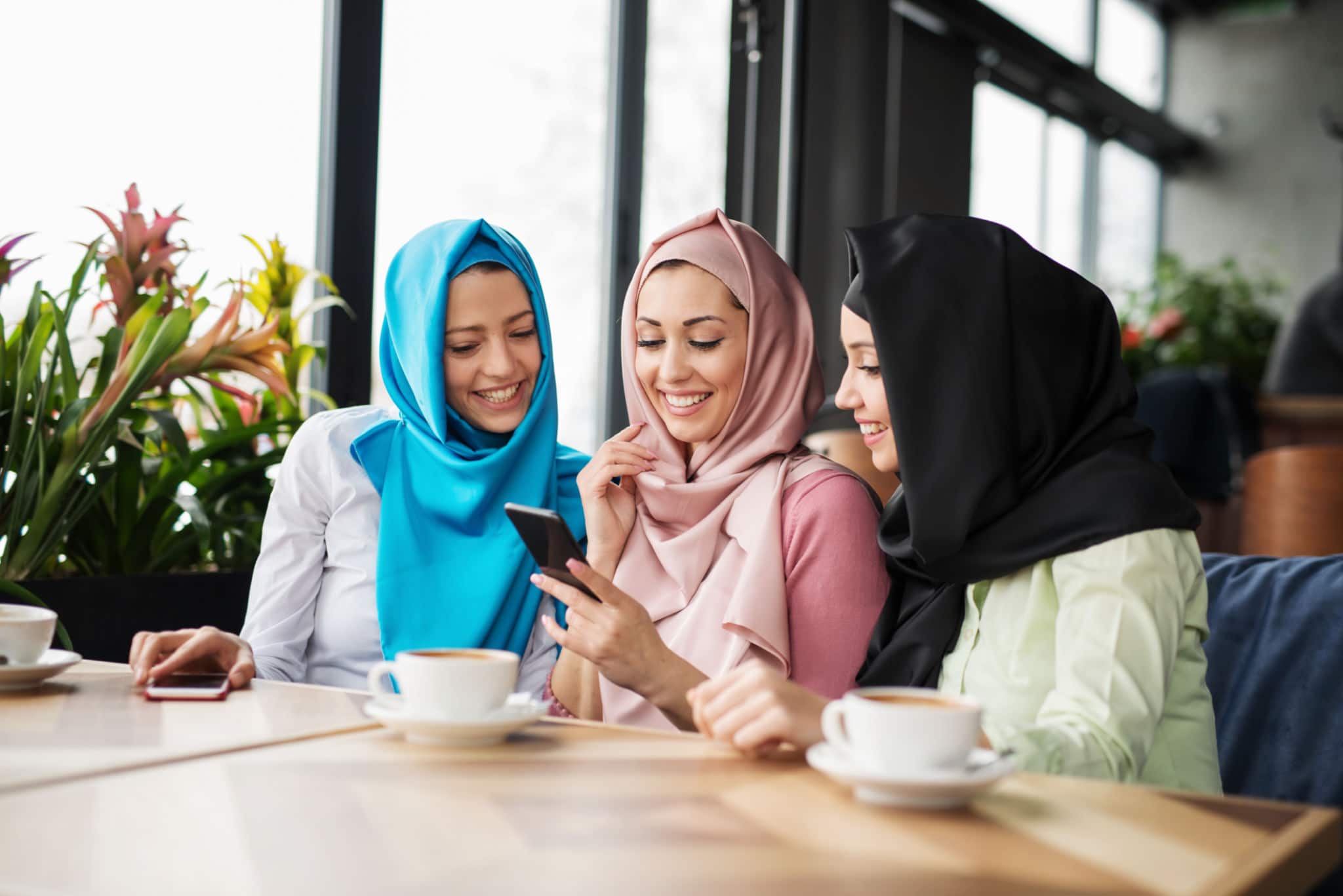 Group of islamic girls using smart phone